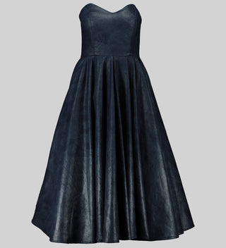 Luxurious denim corset dress with a strapless, sweetheart neckline. Fitted bodice with boning for a cinched waist. Flared skirt creates a figure-flattering silhouette. AFI Privé design. Made in Africa. Available at House of Nala in Sandton City. Cocktail Dress