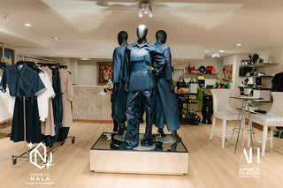 Mannequins wearing blue denim  outfits in a clothing store 'House of NALA' branding.