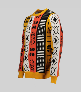 BAR Harvest Bed Knit Jumper Side -  View of the boxy silhouette of the viscose knit sweater with the orange and red geometric pattern extending along the sides.
