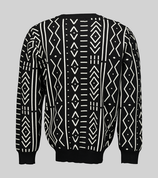 Black and white African print knit sweater with a boxy fit and long sleeves.