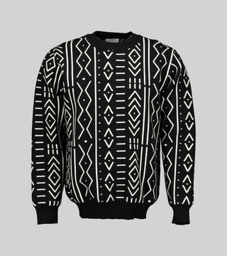 Black and white African print knit sweater with a boxy fit and long sleeves. The sweater features a warrior belt design in the centre.