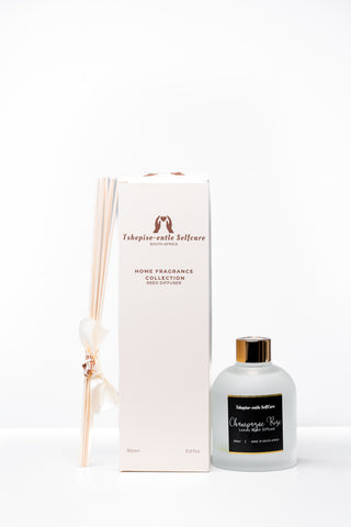 Set of home fragrance diffuser with packaging on a white background by Tshepiso-Entle at House of NALA