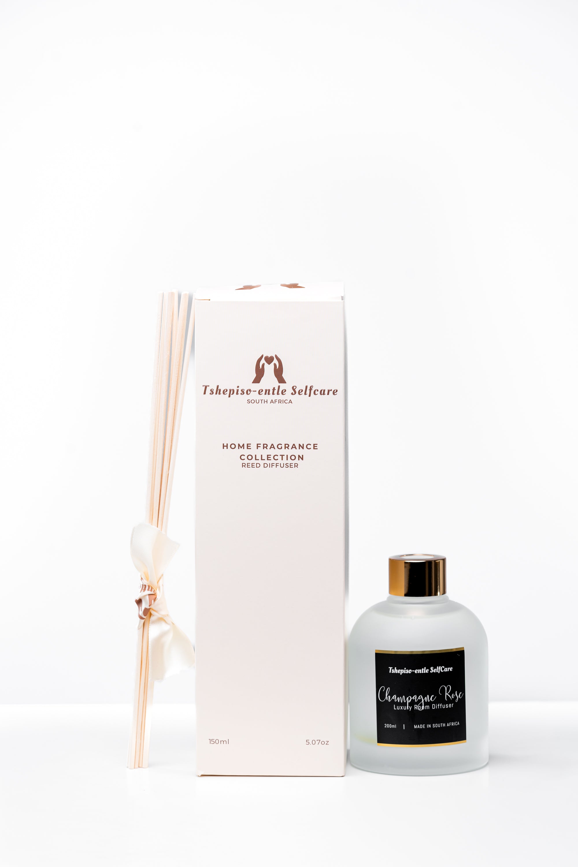 Set of home fragrance diffuser with packaging on a white background by Tshepiso-Entle at House of NALA