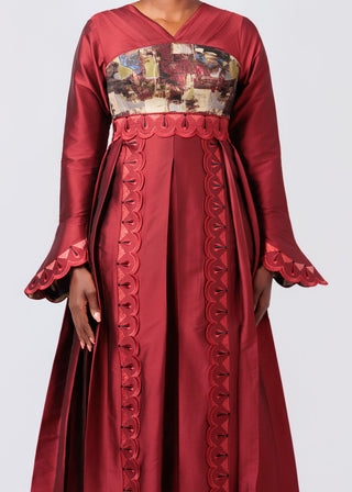 Red dress with intricate design on a white background available at House of NALA.