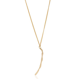 Gold necklace with a unique pendant on a white background