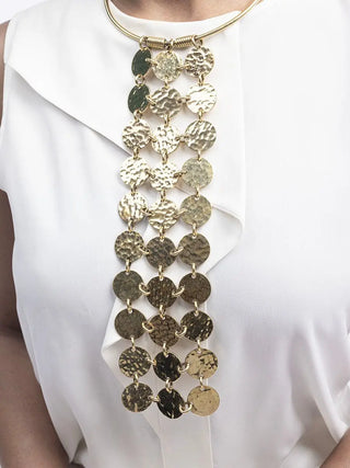 Gold necklace with circular links worn by a person on a white background available at House of NALA Sandton City.