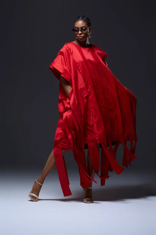 Model wearing red flowy dress