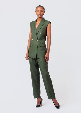Woman wearing NALA Privé Olive Green Sleeveless Blazer Jacket on a white background. Buy at House of NALA 
