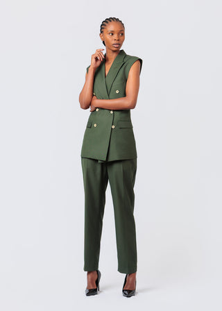 Woman wearing NALA Privé Olive Green Sleeveless Blazer Jacket on a white background avalable at House of NALA