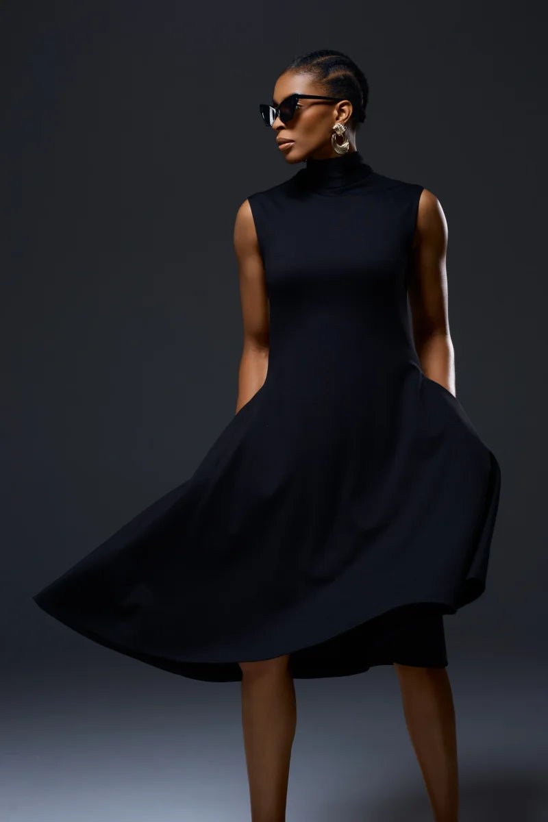 Model wearing NalaPriveKnitTurtleneckWithButtonDress