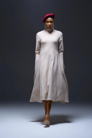 Model wearing Nala Privé Knit Turtle Neck Long Sleeved Dress