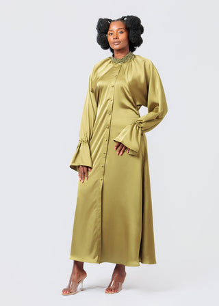 Woman wearing a long Olive Green Kimono Dress on a white background
