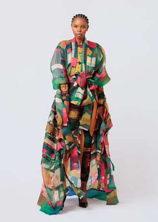 Person wearing a colorful patterned Kimono on a white background available at House of NALA