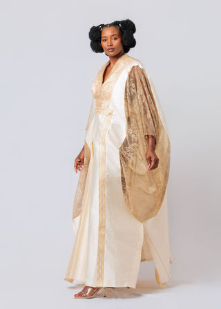 Woman wearing a long, light-colored dress Satin_Embroidered_Dress