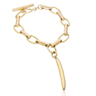 Gold chain bracelet with a unique pendant on a white background