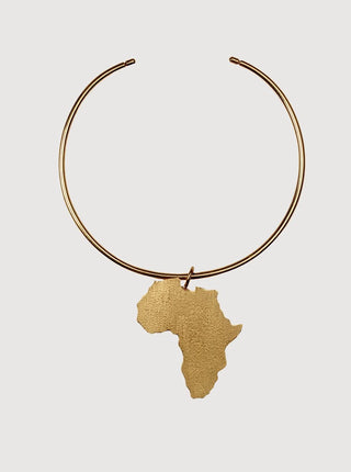 Gold necklace with Africa map pendant on a light gray background