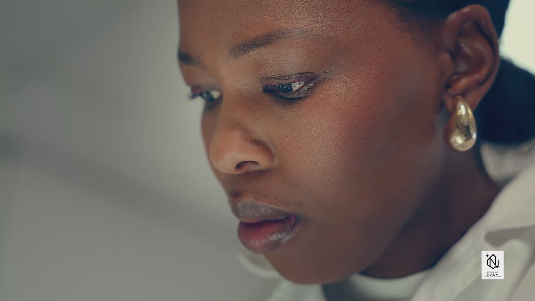 NALA Atelier video of fashion designers and Tailors working in a studio creating clothing.